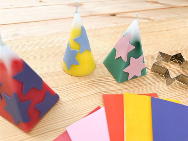 party hats, stars, candles, confetti, colorful paper