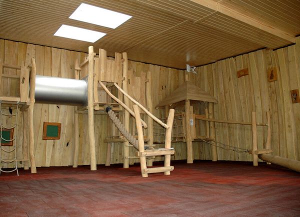 wooden playground, indoor playset, treehouse, climbing structure, slide