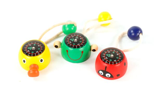 Kinderkompass, Spieluhr, Holzspielzeug, Pfeil-Kompass, Bunte Figuren