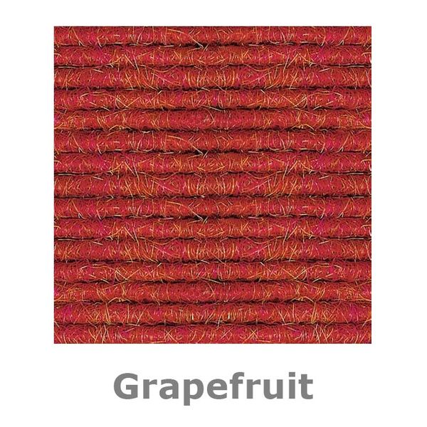 grapefruit, red rug, coarse texture, fiber strands, rug pattern