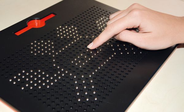 perforated plate, touchscreen pad, hand on surface, vented panel, black metal plate
