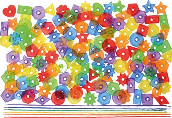 bunte plastikperlen, perlen sortiert, kreativset, handwerkzeug, gemüse?