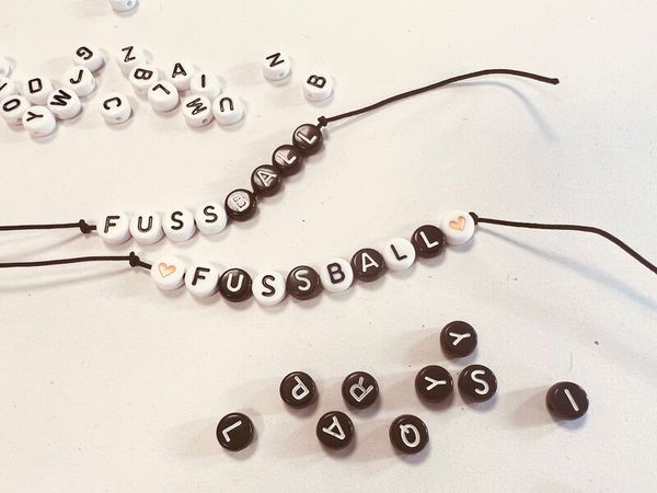 Kunststoffperlen Buchstaben schwarz, 500 Stück Kunststoffperlen Buchstaben schwarz, 500 Stück