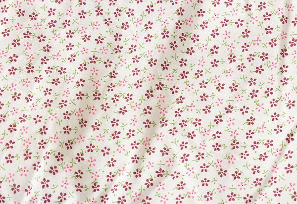 Blumenmuster, rosa Blüten, grüne Blätter, Stoff, Textil